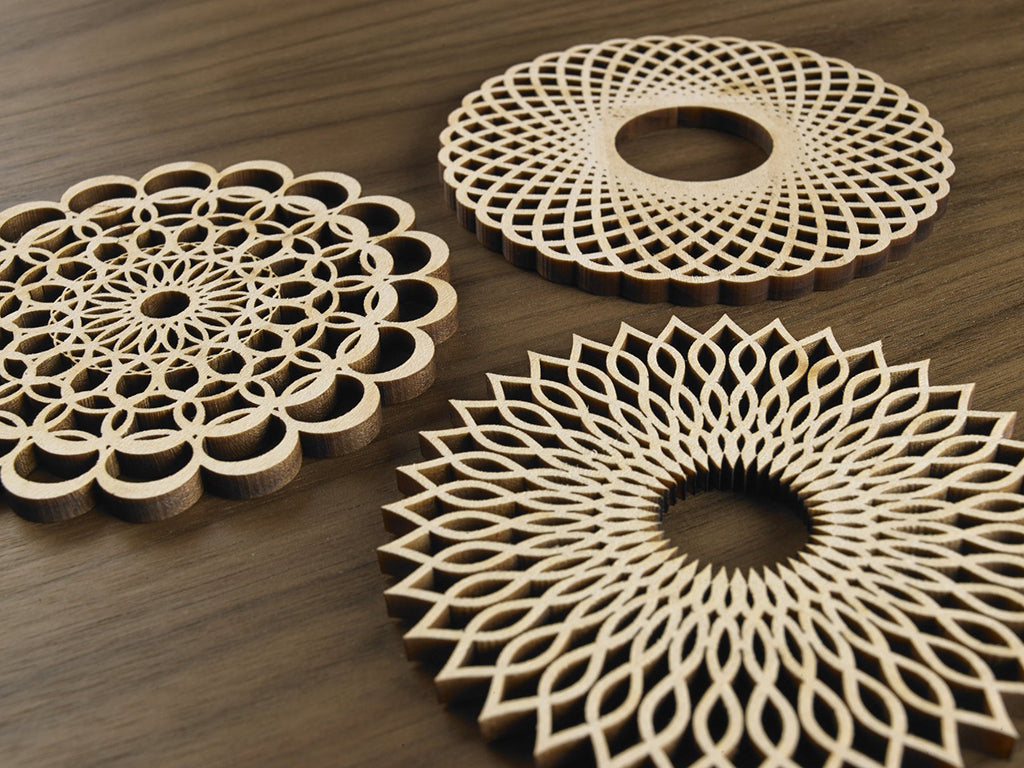 Five Ply Design set of 3 laser cut trivets Spiral Series Close Up